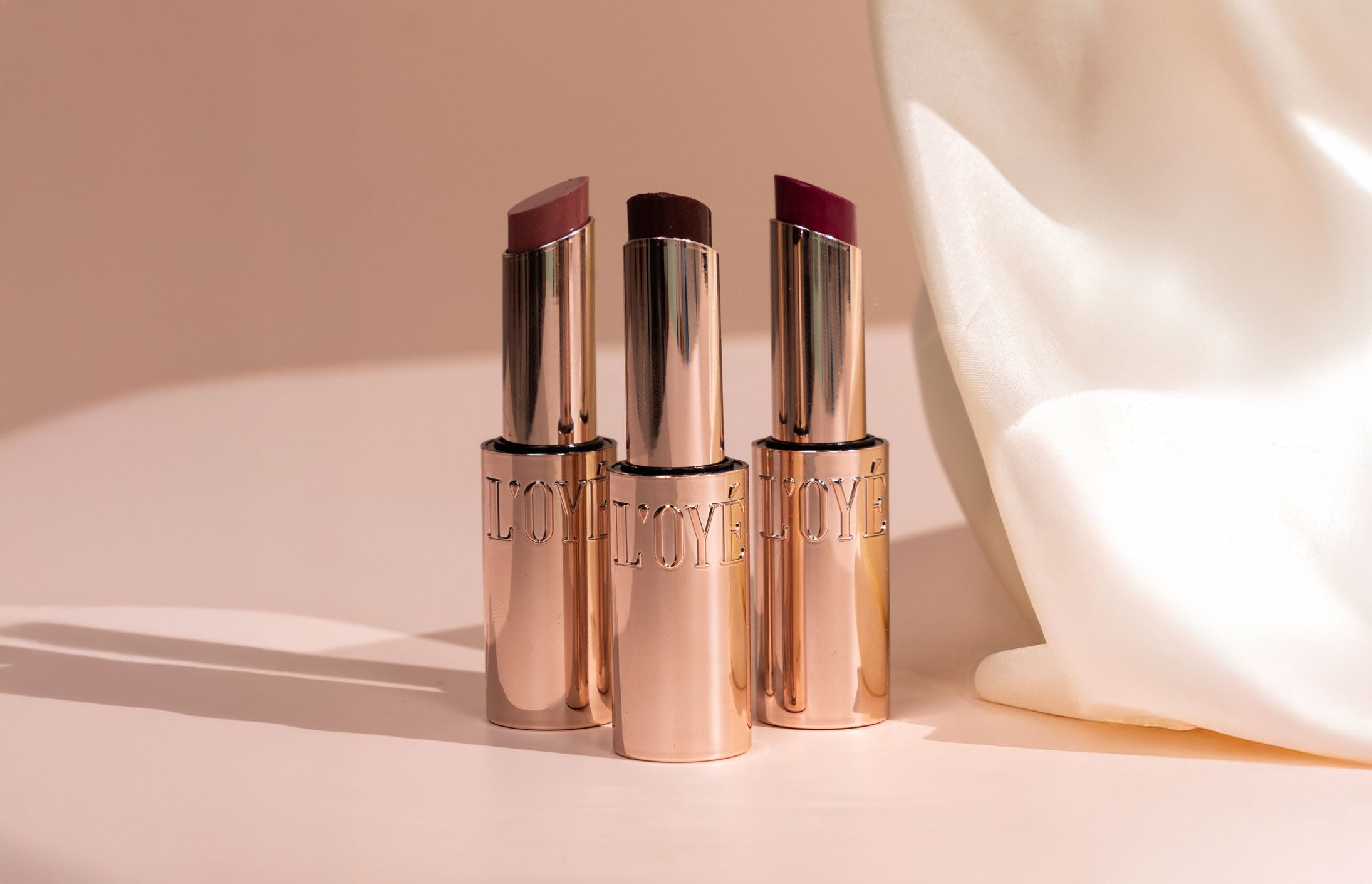 Why sheer glossy tints are the modern alternative to heavy lip looks