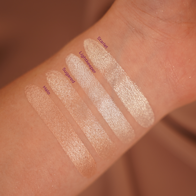 Oogschaduw swatches met witte en nude kleuren: Starlet, Lightkeeper, Sugared, Halo.
